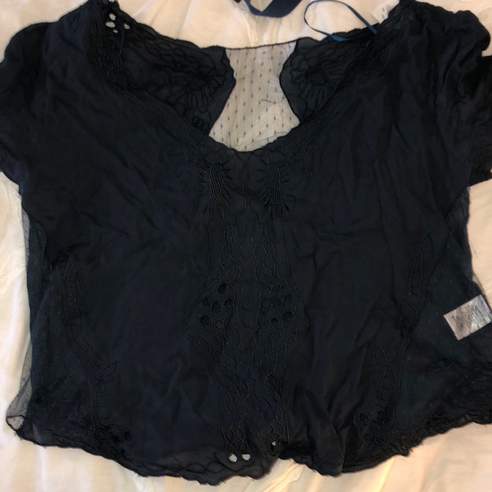 see through blue blouse